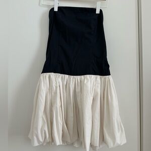 Black and white strapless mini dress with bubble hem